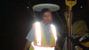 Yeweinishet "Weini" Mesfin, a night janitor at Disneyland Resort, poses for a playful photo during one of her shifts. Mesfin was homeless and living out of her car, a secret she kept from family and coworkers. She died in her car in late 2016. (Photo courtesy of Mindy Martin)